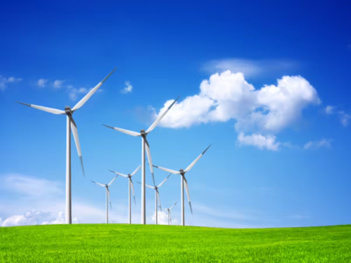 Wind turbines on green field